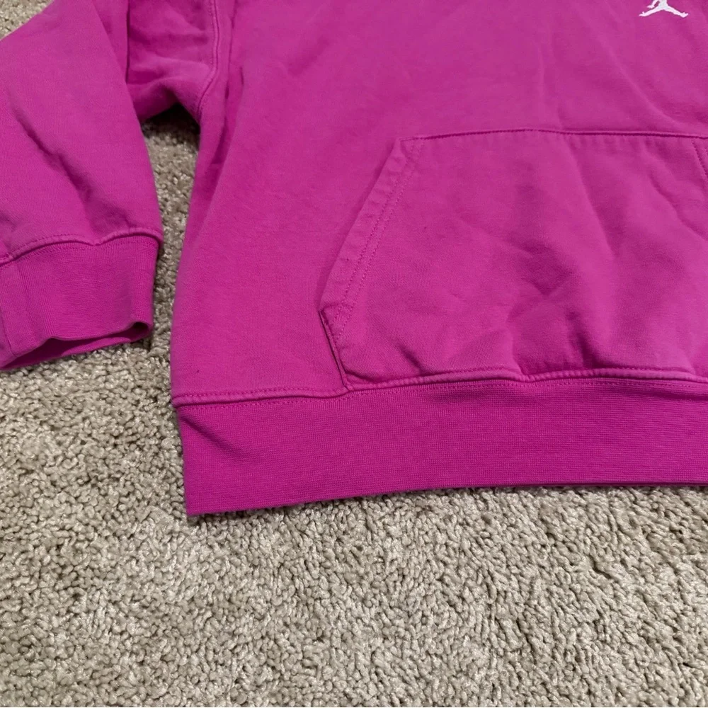 Jordan Big Girls' Brooklyn Essentials Hoodie in a pink/fuchsia color size 12-13